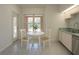 Bright kitchen with a small table, seating for two, and a window for natural light at 29211 Picador St, Punta Gorda, FL 33982