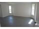 Spacious living room with ample natural light, offering a blank canvas for customization at 29211 Picador St, Punta Gorda, FL 33982