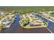 Lovely waterfront homes with private boat docks along canal, creating perfect retreat setting at 3016 Curry Ter, Port Charlotte, FL 33981