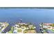 Scenic aerial view of waterfront homes, docks, and canals, showcasing the beauty of coastal living at 3016 Curry Ter, Port Charlotte, FL 33981