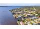 Scenic aerial view of beautiful waterfront homes along canals, each with a private boat dock at 3016 Curry Ter, Port Charlotte, FL 33981