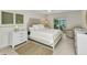 Comfortable bedroom featuring natural light, a ceiling fan, and a sliding glass door to the outdoors at 3016 Curry Ter, Port Charlotte, FL 33981