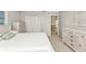 Bright bedroom featuring double closets, neutral decor, and tile floors at 3016 Curry Ter, Port Charlotte, FL 33981
