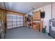Spacious garage area featuring ample storage and an automatic door at 3051 Chicory Ter, Punta Gorda, FL 33983