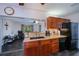 Kitchen featuring dark wood cabinets and stainless steel appliances at 3051 Chicory Ter, Punta Gorda, FL 33983