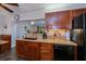 Kitchen featuring wood cabinets and stainless steel appliances at 3051 Chicory Ter, Punta Gorda, FL 33983