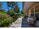 Spacious patio deck overlooking a tranquil pond and lush tropical greenery, ideal for outdoor enjoyment at 3051 Chicory Ter, Punta Gorda, FL 33983