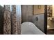 Walk-in shower offers tiled walls, rain shower head, and glass partition at 3051 Chicory Ter, Punta Gorda, FL 33983