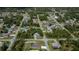 Aerial view of neighborhood showcasing community layout and surroundings at 3175 Lakatos St, North Port, FL 34286