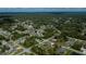 Aerial view of the neighborhood, highlighting the location and landscaping at 3175 Lakatos St, North Port, FL 34286