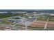 Wide aerial shot showcases the baseball stadium and surrounding parking lots at 3175 Lakatos St, North Port, FL 34286