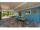Spacious covered back porch is perfect for entertaining and provides serene views at 3175 Lakatos St, North Port, FL 34286