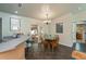 Inviting dining area with seating for four and access to the outdoor patio at 3175 Lakatos St, North Port, FL 34286