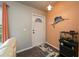 Cozy entryway with tile flooring, nautical decor, and a view of the home's interior at 3175 Lakatos St, North Port, FL 34286