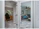 Hallway view of bedroom and office spaces, showcasing the home's layout at 3175 Lakatos St, North Port, FL 34286
