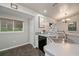 Spacious kitchen featuring modern sink and adjacent to the dining area at 3175 Lakatos St, North Port, FL 34286