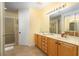 Bright bathroom showcasing double vanity, walk-in shower and lots of space at 3334 Purple Martin Dr # 214, Punta Gorda, FL 33950
