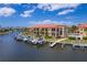 Waterfront condos featuring boat slips and a community pool for residents at 3334 Purple Martin Dr # 214, Punta Gorda, FL 33950