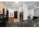 Open kitchen showcasing granite counters, stainless steel appliances, and ample storage at 3334 Purple Martin Dr # 214, Punta Gorda, FL 33950