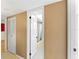 Hallway view of a bathroom featuring a tub with white shower curtain at 3561 Middletown St, Port Charlotte, FL 33952