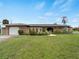 Charming single-story home with a well-manicured lawn and attractive landscaping in a great neighborhood at 3561 Middletown St, Port Charlotte, FL 33952