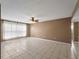 Spacious living room featuring tile flooring and natural light at 3561 Middletown St, Port Charlotte, FL 33952