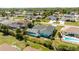 Overhead view featuring a pool and the surrounding homes in the neighborhood at 4260 Kessler Ter, North Port, FL 34287