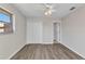 Bedroom with wood floors, neutral walls, and a closet at 428 Briarwood Rd, Venice, FL 34293
