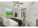 Bedroom featuring a large window and closet at 4336 Blackman St, North Port, FL 34291