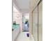 Shower with sliding doors, and a view of the backyard at 4461 La France Ave, North Port, FL 34286