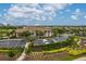Beautiful clubhouse with manicured landscaping, ample parking, and a welcoming entrance at 4461 La France Ave, North Port, FL 34286