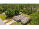 Charming home with a well-maintained lawn and side shed in a lush and serene neighborhood setting at 4461 La France Ave, North Port, FL 34286