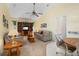 Cozy living area featuring comfortable seating and a built-in entertainment center at 4461 La France Ave, North Port, FL 34286