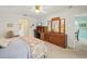 Main bedroom with carpeting featuring an office setup at 4461 La France Ave, North Port, FL 34286