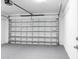 View of a clean garage featuring an automatic door at 4880 Cornsilk Ter, North Port, FL 34286