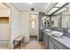 Bathroom featuring a double sink vanity with modern fixtures and decor at 58 Lakeview Dr, North Port, FL 34287