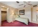 Bedroom with a ceiling fan, closet, and lamp at 58 Lakeview Dr, North Port, FL 34287