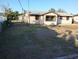 View of backyard with chain link fence at 7321 Bolten Ln, Port Charlotte, FL 33981
