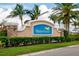 Beautiful Waterford community entrance sign surrounded by lush landscaping at 7501 Mikasa Dr, Punta Gorda, FL 33950