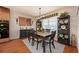 Cozy dining area featuring a wooden table and decorative accents, perfect for entertaining at 7501 Mikasa Dr, Punta Gorda, FL 33950