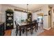 Comfortable dining area featuring a wooden table and decorative accents, perfect for entertaining guests at 7501 Mikasa Dr, Punta Gorda, FL 33950