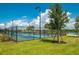 Well-maintained community pickleball courts with blue and green surfaces at 7501 Mikasa Dr, Punta Gorda, FL 33950