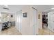 View of hallway featuring office space and multiple closets for storage at 9850 Fiddlers Green Cir # 130, Rotonda West, FL 33947