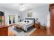 Serene bedroom with access to a private balcony at 1102 Hunt Club Ln, Valrico, FL 33594