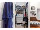 Walk-in closet with built-in shelves and drawers, providing ample storage space for clothes and accessories at 1102 Hunt Club Ln, Valrico, FL 33594