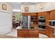 Kitchen featuring stainless steel appliances and an island at 1102 Hunt Club Ln, Valrico, FL 33594