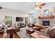 Inviting living room features a fireplace and comfortable seating at 1102 Hunt Club Ln, Valrico, FL 33594