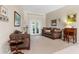 Cozy living room with plush seating, natural light, and elegant decor, creating a warm and inviting space at 1102 Hunt Club Ln, Valrico, FL 33594