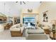 Spacious living room with tile floors, high ceilings, and a seamless connection to the outdoor pool area at 1134 Coronado Dr, Punta Gorda, FL 33950