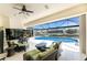 Relax on the screened patio overlooking the pool and the serene canal views at 1134 Coronado Dr, Punta Gorda, FL 33950